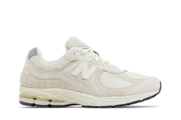 New Balance 2002R Calm Taupe, blanc cassé
