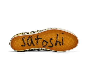 Semelle orange de la Vans Satoshi Nakamoto avec satoshi écrit à la main